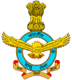 Insignia of the Indian Army featuring a bright red rectangular background with two crossed golden swords at the center, surmounted by the State Emblem of India (Ashoka Lion Capital) also in yellow-gold.