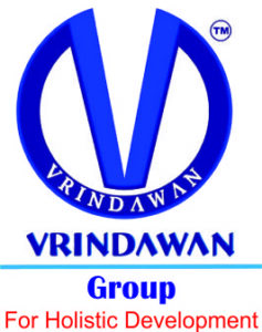 Logo of Vrindawan Group featuring a large blue stylized letter 'V' enclosed in a circle, with the name and the tagline "For Holistic Development" written below.