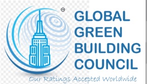 Logo of the Global Green Building Council featuring a light blue graphic of a stylized skyscraper set against a curved globe pattern on a white grid background, alongside the bold blue text "GLOBAL GREEN BUILDING COUNCIL" and the tagline "Our Ratings Accepted Worldwide" at the bottom.