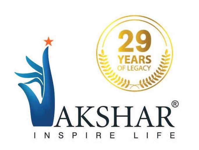 Official brand logo for Akshar Developers featuring a stylized blue hand reach icon topped with an orange star, company tagline "INSPIRE LIFE," and a gold circular emblem reading "29 YEARS OF LEGACY."